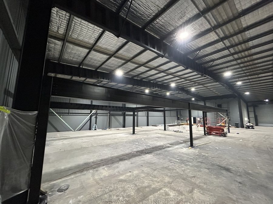 430sqm steel mezzanine frame erected inside the Momentum Health + Fitness warehouse