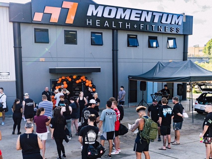 Opening day queue outside Momentum Health + Fitness, Charmhaven NSW